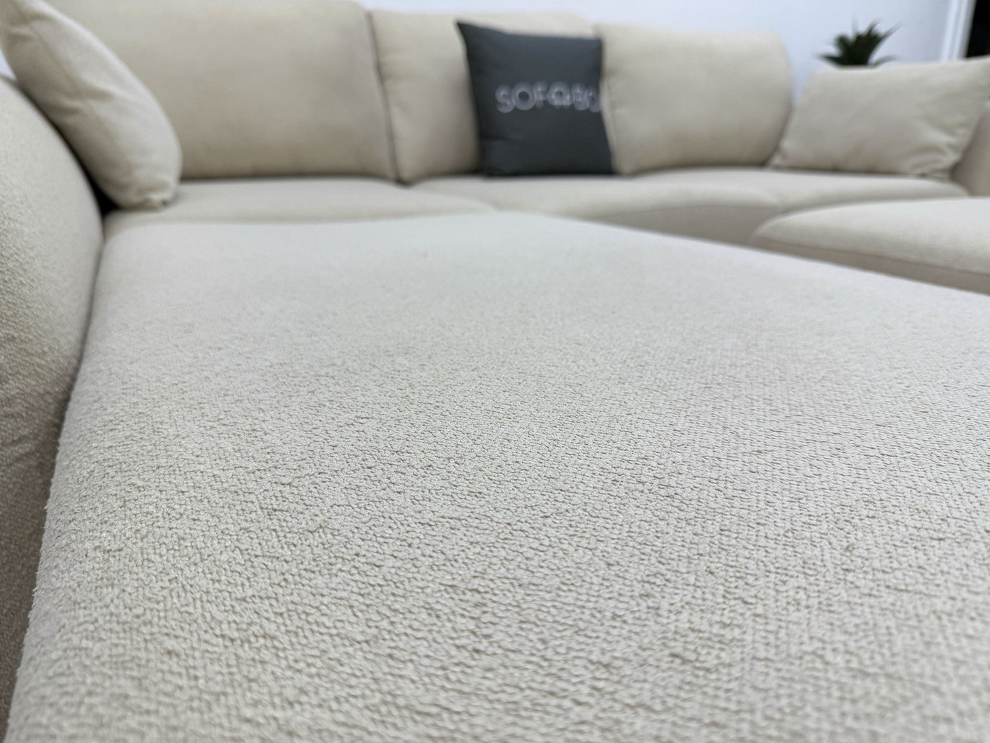 DFS Calix Swivel Corner Sofa Bed In Latte