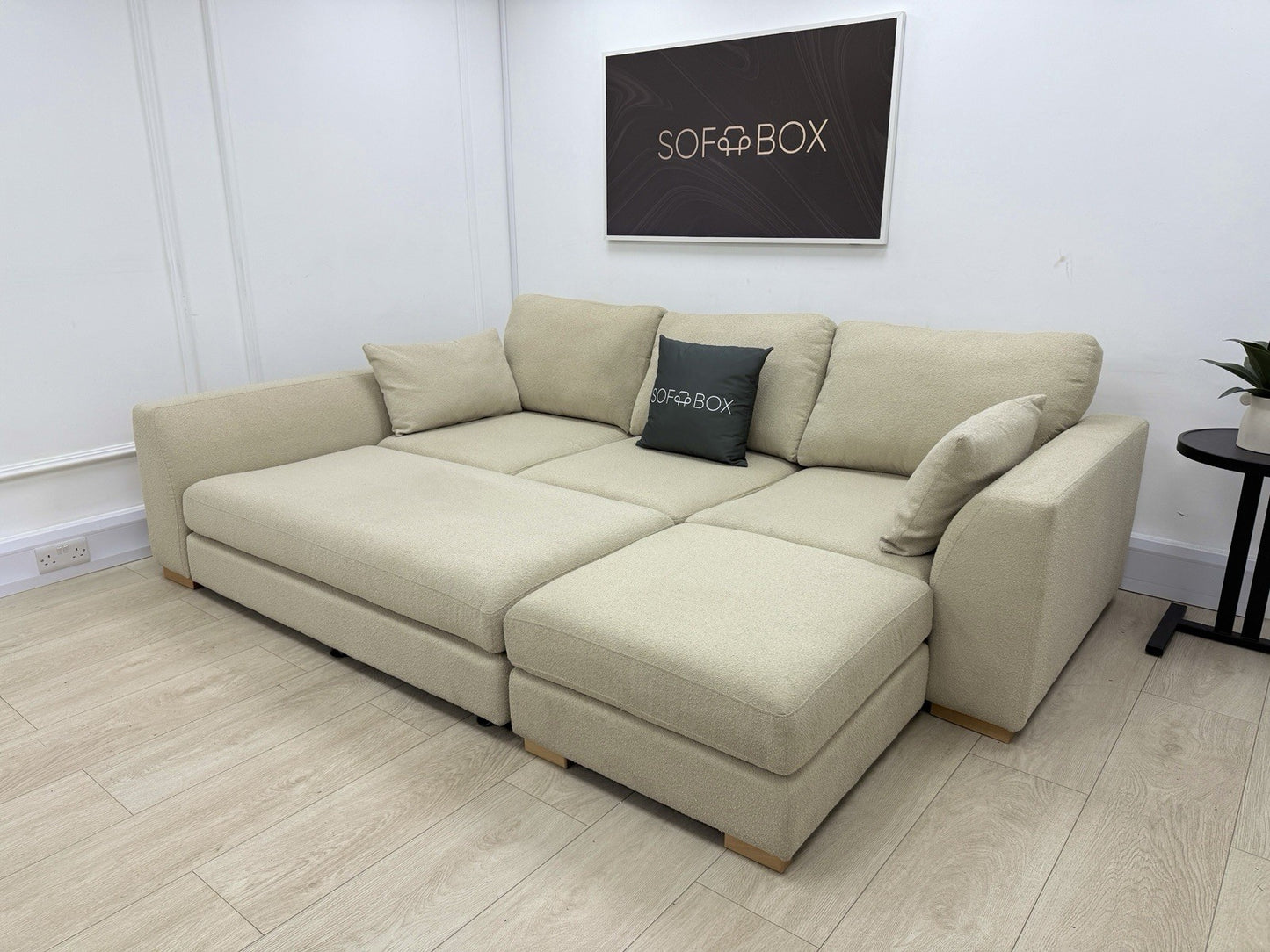 DFS Calix Swivel Corner Sofa Bed In Latte