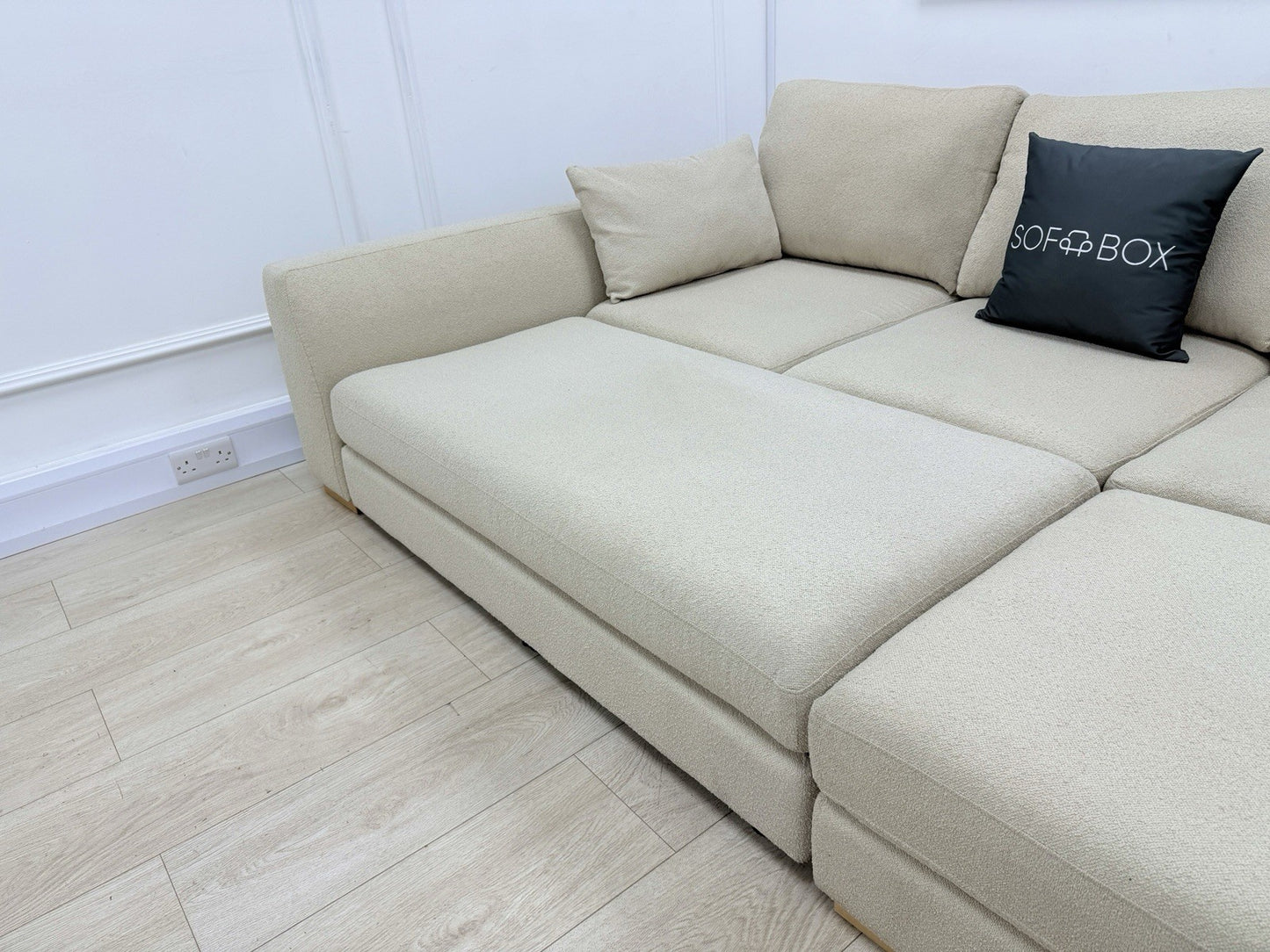 DFS Calix Swivel Corner Sofa Bed In Latte