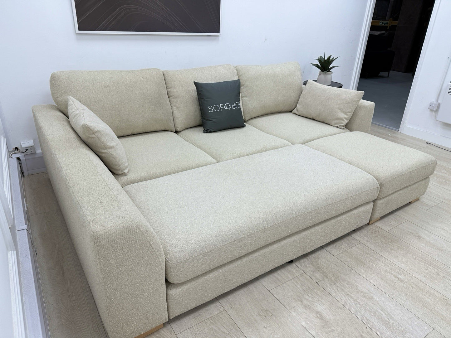 DFS Calix Swivel Corner Sofa Bed In Latte