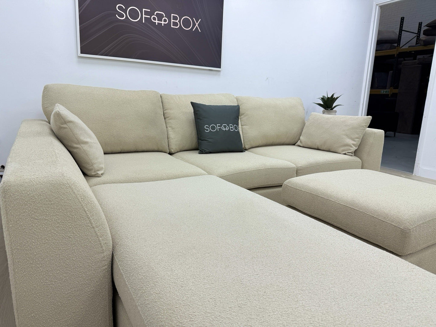 DFS Calix Swivel Corner Sofa Bed In Latte